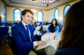University of Illinois Urbana-Champaign student Nathan Knoll presents his response to a prompt as political science students navigate ways to defuse and open dialogue in a polarized political environment as part of the Richard G. and Carole J. Cline Symposium “Bridging Political Differences in a Polarized World" held on Oct. 24 at the Illini Union Ballroom.