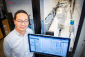 Portrait of Huimin Zhao in one of the biofoundry facilities on the U. of I. campus.