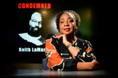 Rachel McMillian seated in front of an image of Keith LaMar's memoir "Condemned: The Whole Story"