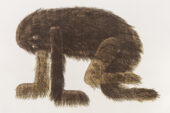 Image of a print of a furry creature on all fours.
