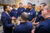 Kenneth Nixon, left, talks to police recruits about his own wrongful conviction at age 19 for a murder he did not commit.