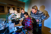 U. of I. researchers Marcelo Garcia, left, Mayandi Sivaguru, seated, and Bruce Fouke.