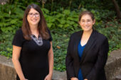 Professor Lori Raetzman and student Rachel Gonzalez stand outdoors.