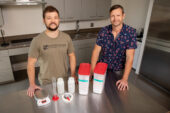 Photo of researchers standing in a laboratory with equipment and supplements used in the study on the bench in front of them.