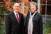 Sheldon Jacobson and Janet Jokela stand outdoors.