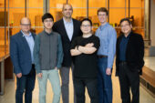 Group portrait of researchers Wawrzyniec Dobrucki, Zhongmin Zhu, Viktor Gruev, Zuodong Liang, Steven Blair and Shuming Nie.