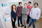 Classics professor Angeliki Tzanetou at Spurlock Museum of World Cultures with some of the students in her class.