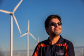 Graduate student Lucas Buccafusca looks for ways to improve the efficiency of wind farms. He had a key insight on a foggy day near a wind farm in central Illinois.