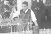 St. Elmo Brady works with chemicals in a laboratory