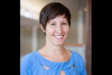 Photo of Michelle D. Layser, a professor of law at Illinois