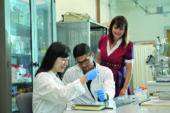 At right, Catherine Best, a research professor of bioengineering, supervises students, including REU participant Javier de Jesus Astacio, center, who is studying mechanical engineering at the University of Puerto Rico, Mayaguez, and Yujin Lee, an Illinois junior in bioengineering.