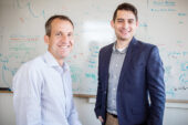 Mechanical science and engineering professor Harley Johnson, left, and graduate student Brian McGuigan look to a common optical phenomenon for inspiration in electronics design.