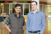 Photo of Madhu Viswanathan, left, and  U. of I. graduate Steven Morse.