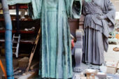 Alma Mater and Learning pose from the neck down at a Chicago-area conservatory -- their heads removed to be laser cleaned and to replace fasteners. The sculpture, which was removed from its pedestal last year to fix extensive water damage, originally was cast in bronze in 30 pieces. The sculpture is expected to be back in place by commencement 2014