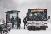 Passengers board an MTD bus at the Transit Plaza on Wright Street during a Feb. 6 snowstorm that dropped 4 1/2 inches of snow on Champaign-Urbana. A week later, a blizzard dumped an additional 13 inches of snow. High winds and blowing snow made streets and sidewalks impassable, prompting the UI to cancel classes for the first time since 1979.