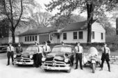 For years the UI Police Departments headquarters was located here, at 101 N. Mathews St., Urbana, until officers and equipment in 1993 were moved down the street to the new Public Safety Building at 1110 W. Springfield Ave. The Mathews Street building was razed to make room for the loading dock area of the Grainger Engineering Library Information Center, which opened in 1994.  Click photo to enlarge