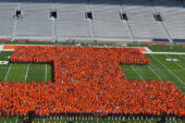 Members of the Class of 2017 pose for a photo at Memorial Stadium on Aug. 23. According to fall enrollment statistics released this week, there are 7,331 freshmen this year.