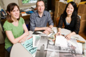 Quality by design Although the UI's literary arts magazine, Ninth Letter, is designed by students and its content ranges from previously unpublished writers to best-selling authors, the guiding force behind its production and publication are university faculty and staff members. Pictured, from left, are editor Jodee Stanley, and art and design professors Joseph Squier and Jennifer Gunji-Ballsrud. Squier co-founded the magazine and curates its online component; Gunji-Ballsrud is its art director.  Click photo to enlarge