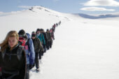 Class crosses Larsbreen Glacier in Svalbard, Norway.