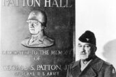 In memory Col. Oscar Koch poses before a plaque honoring his former commander, Gen. George S. Patton Jr., following the dedication of Patton Hall at Fort Riley in 1946. Koch was the head of the Armys intelligence school at Fort Riley.  Click photo to enlarge