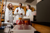 Sophomores Miranda Dawson, left, and Pierce Hadley, right, work in bioengineering professor Rohit Bhargavas lab as part of the Illinois Cancer Scholars Program.