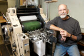 Ken Smith, a 12-year UI employee who works at Document Services, has been a printer since the 1970s and a jazz music enthusiast for much longer. Smith was one of six pressmen at Printing Services when he started in 2000. Because of industry changes and unit restructuring last year, he is the last to hold the press technician title in the newly configured Document Services unit.  Click photo to enlarge