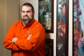Order from chaos Jerry Dinnin, service order supervisor for Facilities and Services, says the first word of his title "service" allows the other parts to fall into place. A former phone salesman, Dinnin said making the customer happy is always his first priority.  Click photo to enlarge