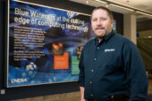 Michael Showerman, a computer systems administrator for the National Center for Supercomputing Applications, has a job description that takes into account his penchant for finding ways to apply computer systems to scientific research. He started working at NCSA as a student in 1995 and "never left," he said. He currently works on the Blue Waters supercomputer.  Click photo to enlarge