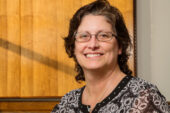 Elizabeth Schleef, the chief clerk for the Office of Technology Management and a U. of I. employee since 2000, was uncertain about her choice to re-enter the workforce after raising twin daughters. "After about two days, I knew I had made the right decision," she said.  Click photo to enlarge