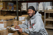 Bryan Brownfield, a route driver helper at Campus Stores, Mail and Receiving, has worked at the U. of I. for nearly nine years. He said he enjoys the job because it allows him to see the campus and meet a variety of people, and because there also are times he's out in a truck by himself with nothing but his thoughts. In his spare time he collects Lego sets and writes for pleasure.  Click photo to enlarge