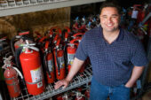 John Rhoades is a safety officer in Facilities and Services. He is responsible for tracking, inspecting and arranging for maintenance and replacement of te thousands of fire extinguishers across campus.