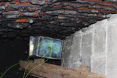 The original time capsule was replaced into the rebuilt gateway's wall Jan. 28.  Click photo to enlarge