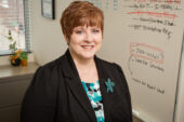 Risky business Joda Morton, associate director of the Office of Enterprise Risk Management, may have a longer list than Santa - with dozens of campus risks prioritized in a report presented to the U. of I. Board of Trustees every two years. The university has been utilizing ERM for five years in an attempt to minimize risks before they take their toll on finances or academic reputation.  Click photo to enlarge