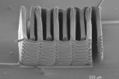 For the first time, a research team from Harvard University and the University of Illinois at Urbana-Champaign demonstrated the ability to 3-D-print a battery. This image shows the interlaced stack of electrodes that were printed layer by layer to create the working anode and cathode of a microbattery.