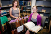 Illinois librarians Jennifer Hain Teper, left, and Emily Shaw see mass-digitization projects as an opportunity to restore crumbling books.