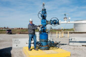 Robert J. Finley, principal investigator on the Illinois Basin - Decatur Project, turns the main valve to start injection of CO2 into the Mount Simon Sandstone.