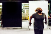 University of Illinois theater professor Lisa Gaye Dixon strikes a pose during a rehearsal of a new solo piece, My Case is Altered: Tales of a 21st Century Roaring Girl. Dixon has been working on the piece with director and choreographer Struan Leslie, who spent a month as a visiting artist in the U. of I. department of theatre.