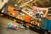 U. of I. graduate Tatyana McFadden pushes herself hard during a workout at the campus Paralympic training facility, one of many campus amenities available for students and athletes with disabilities. McFadden, born with spina bifida and paralyzed from the waist down, in 2013 became the first athlete to win four major marathons in a single year, taking the womens wheelchair division at London, Boston, Chicago and New York City, and repeated the feat in 2014.