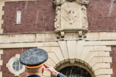 The flag flies once again atop the U. of I. Armory south entrance after military professors raised money to restore a damaged flagpole that had been placed on the 100-year-old building in the 1920s. A flag hasnt flown from the pole in decades, though that changed May 26 with a rainy rededication ceremony, which was moved inside after the flag was raised. Offering the first salute was Lt. Col. Eric Stetson, a U. of I. professor of military science. The building houses the Reserve Office Training Corps programs and an indoor running track used by U. of I. teams.