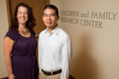 Environmental factors such as crime and poverty rates in the neighborhood where children live influence nonresident fathers' engagement with their children, suggests a new study by Saijun Zhang, right, and Tamara Fuller, both faculty members in the School of Social Work.