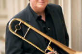 Trombone Jim Pugh has spent the summer touring with Steely Dan.