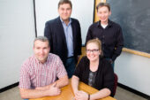 A new study led by Kevin Johnson of the Illinois Natural History Survey (seated, at left), with, left to right, entomology professor Barry Pittendrigh, animal biology professor Ken Paige and postdoctoral researcher Julie Allen, indicates lice are evolving faster than their human and chimpanzee hosts.
