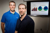 University of Illinois kinesiology and community health professor Charles Hillman, right, and graduate student Mark Scudder looked at electrical activity in the brain to help explain why fitness is associated with better language skills in children.