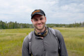 Photo of Brian Charles in an open field