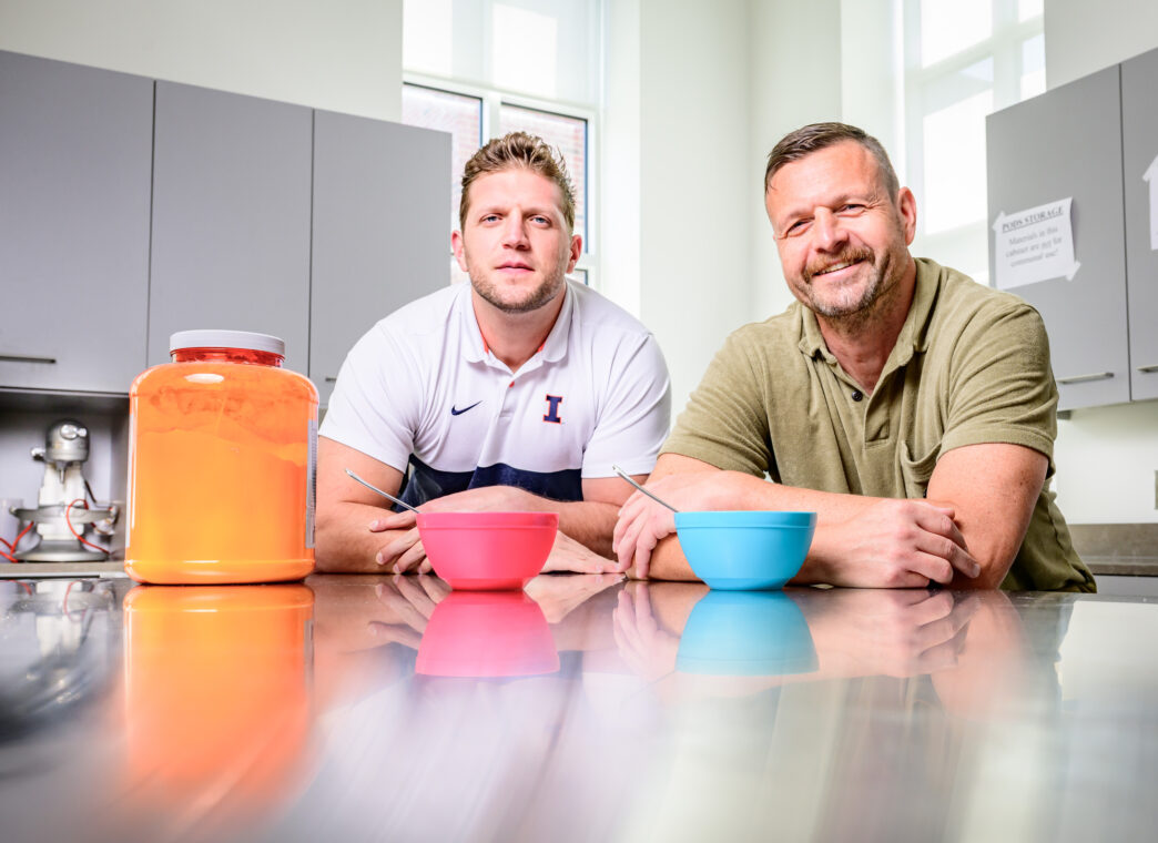 Photo of two researchers in the research kitchen.