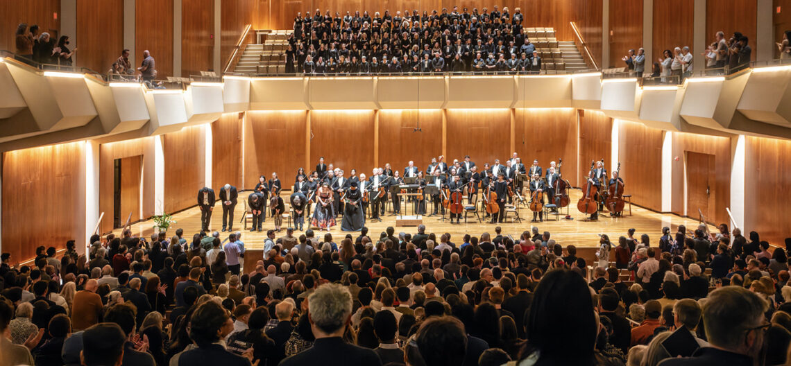 Photo of Sinfonia da Camera onstage at the Great Hall in Krannert Center for the Performing Arts, with the audience in the foreground.