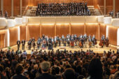 Photo of Sinfonia da Camera onstage at the Great Hall in Krannert Center for the Performing Arts, with the audience in the foreground.