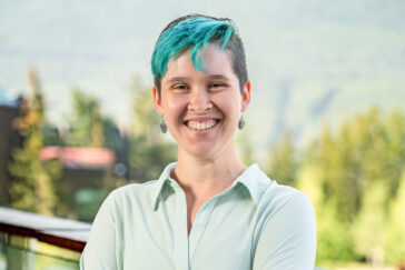 Graduate student Hannah Heath standing outdoors.