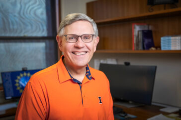 Kelvin Droegemeier, a man with glasses and an orange shirt.
