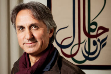 Professor Bayat wearing a burgundy scarf and jacket